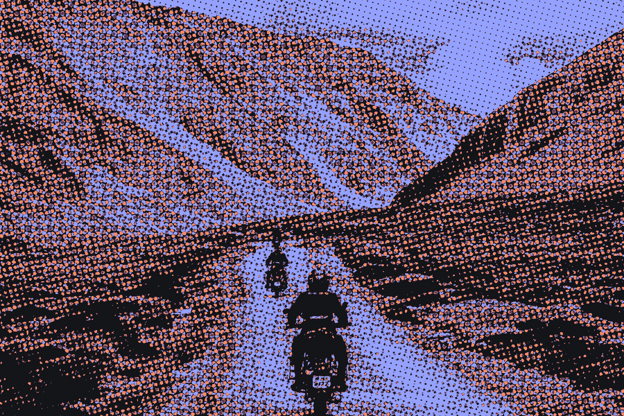 Motorcycles in single file on a mountain road