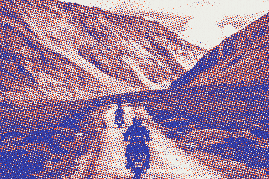 Motorcycles in single file on a mountain road