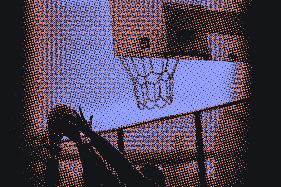 Players reaching for the ball under a chain net